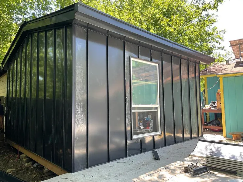 Black standing seam metal wall panels for Roof Inspection in Port Chester